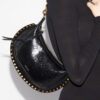 Bolso bandolera de piel con efecto pitón Oskan Moon Bolso bandolera de piel con efecto pitón Oskan Moon