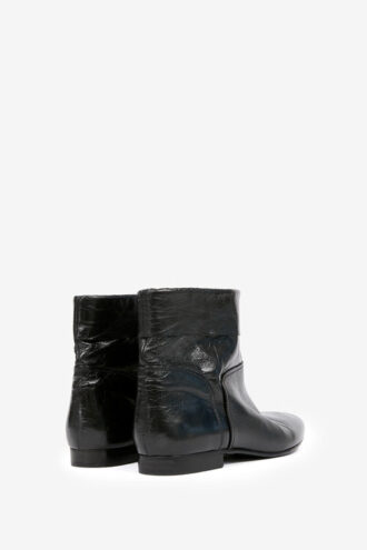 Botas planas de charol Juoza