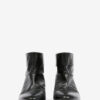 Botas planas de charol Juoza