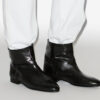Botas planas de charol Juoza