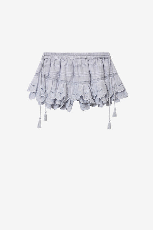 Pantalón corto Puria con volantes de algodón y encaje floral Pantalón corto Puria con volantes de algodón y encaje floral