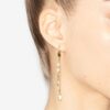 Pendientes colgantes de latón con acabado dorado Pendientes colgantes de latón con acabado dorado