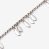 Pulsera de metal con hojas brillantes y colgantes